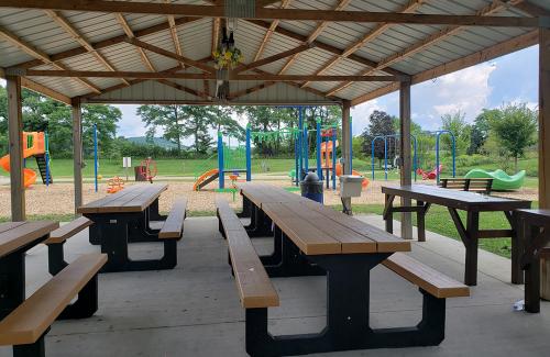 Old Mill Pond Park picnic tables under shelter