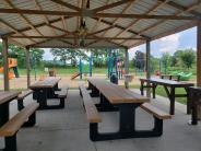 Old Mill Pond Park picnic tables under shelter