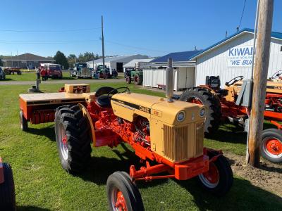 Old case tractor and bailer at fairgrounds