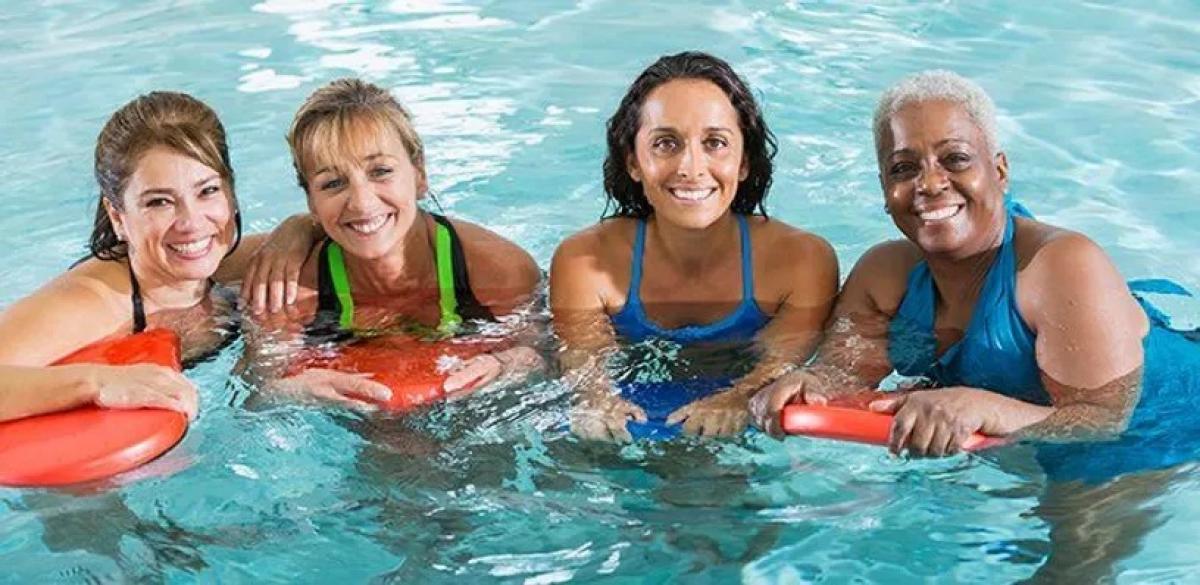 Four swimmers in pool